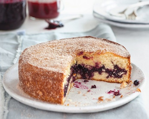 a cake with a slice missing: Jam Cake Recipe